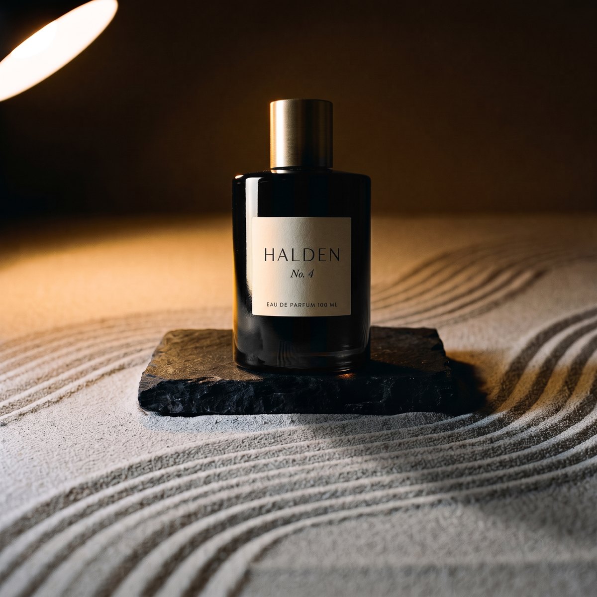 The same Halden No. 4 bottle lit by the set's lamp, label crisp